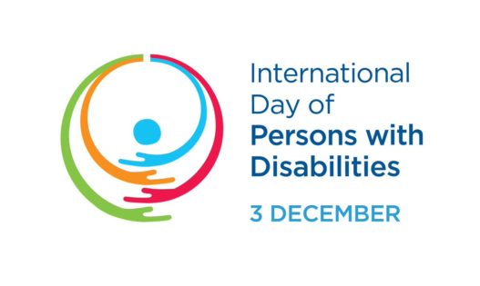 Graphic circles like arms in blue, red, orange and green embracing a blue dot TextInternational day of persons with disabilities 3 december